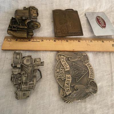 Assortment of Vintage belt buckles including Budweiser