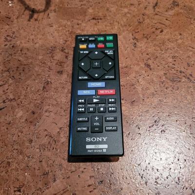 Blue Ray Player, Apple T.V., and Universal Remote (BC-EL)