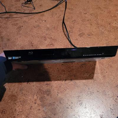 Blue Ray Player, Apple T.V., and Universal Remote (BC-EL)