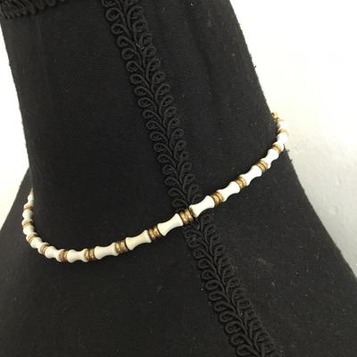 Vintage Monet, gold tone, white Lucite bamboo on chain 28 inch necklace