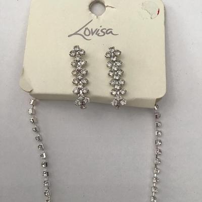 Beautiful rhinestone, silver toned statement, necklace, and earring set