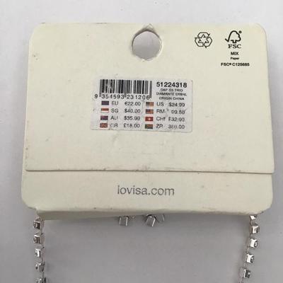 Beautiful rhinestone, silver toned statement, necklace, and earring set