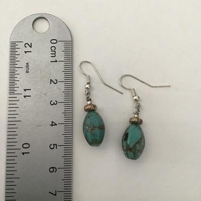 Blue Moon turquoise silver toned dangle earrings