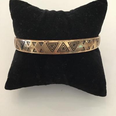 Super cool, gold toned triangle bangle bracelet