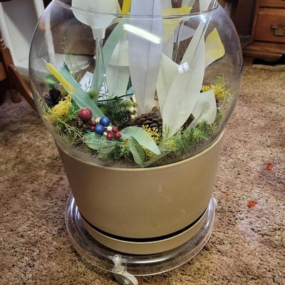 Terrarium with flower arrangement