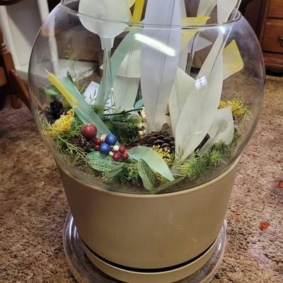 Terrarium with flower arrangement