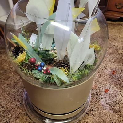 Terrarium with flower arrangement