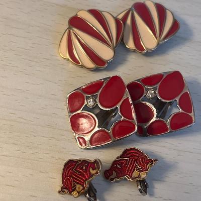 Gold and silver toned clip on red earrings