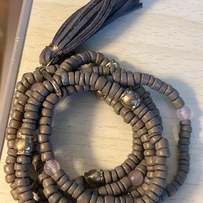 Mauve toned Wooden bead bracelet set