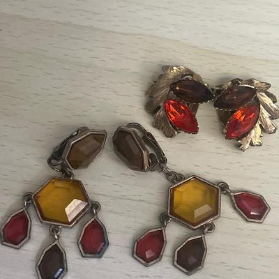 Orange toned clip on earrings