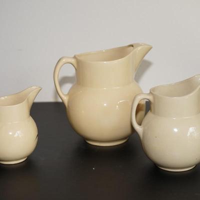 GROUPING OF THREE WATT WARE PITCHERS TO INCLUDE ICE LIP/ SILHOUETTE/ CHERRY PITCHER
