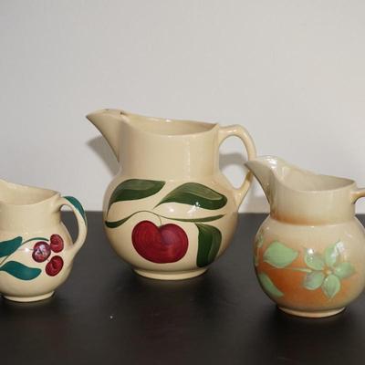 GROUPING OF THREE WATT WARE PITCHERS TO INCLUDE ICE LIP/ SILHOUETTE/ CHERRY PITCHER