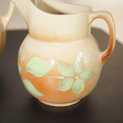 GROUPING OF THREE WATT WARE PITCHERS TO INCLUDE ICE LIP/ SILHOUETTE/ CHERRY PITCHER