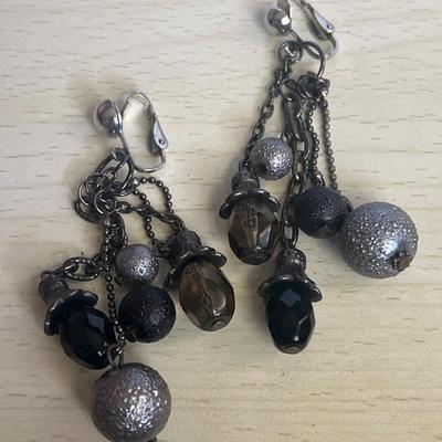 Black and silver toned clip on earrings and necklace set