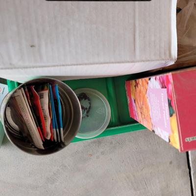 Assorted seeds, flashlights, garden supplies