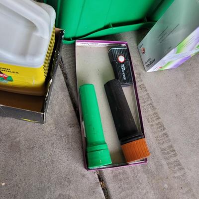 Assorted seeds, flashlights, garden supplies