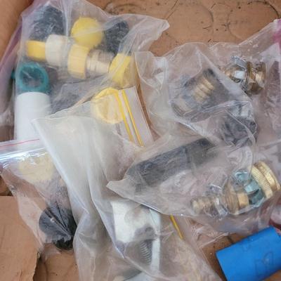 Lot of hose repair and garden items