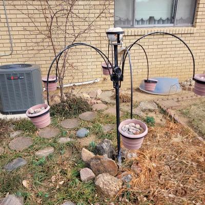 Iron plant holder
