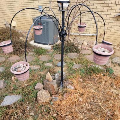 Iron plant holder