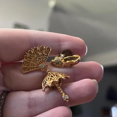 Gold toned pins