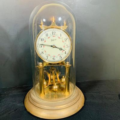 LOT 31: Set of Three (3) Mechanical Glass Dome Anniversary Clocks Featuring John Wanamaker, Forestville German Made Clock and a Smaller...