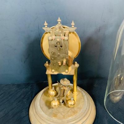 LOT 31: Set of Three (3) Mechanical Glass Dome Anniversary Clocks Featuring John Wanamaker, Forestville German Made Clock and a Smaller...