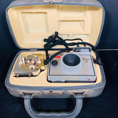 LOT 34: Mid Century Photography Collection Featuring a Ansco Cadet II Camera, Flash and Case; a Kodak Brownie Hawkeye Camera Flash Model...