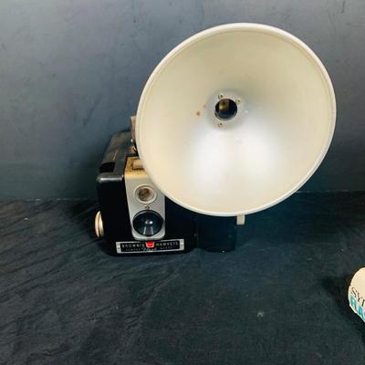 LOT 34: Mid Century Photography Collection Featuring a Ansco Cadet II Camera, Flash and Case; a Kodak Brownie Hawkeye Camera Flash Model...