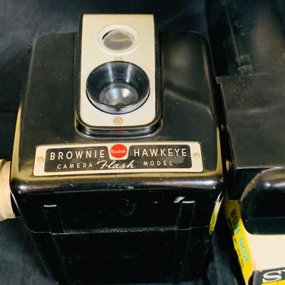 LOT 34: Mid Century Photography Collection Featuring a Ansco Cadet II Camera, Flash and Case; a Kodak Brownie Hawkeye Camera Flash Model...