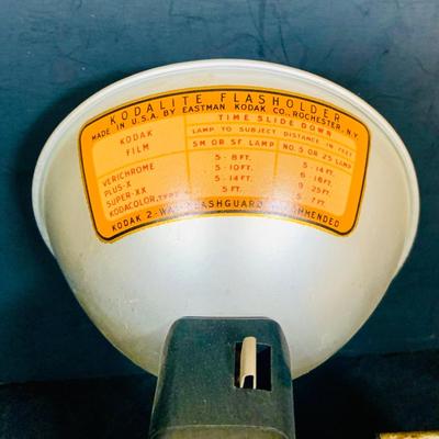 LOT 34: Mid Century Photography Collection Featuring a Ansco Cadet II Camera, Flash and Case; a Kodak Brownie Hawkeye Camera Flash Model...