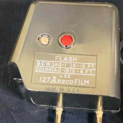 LOT 34: Mid Century Photography Collection Featuring a Ansco Cadet II Camera, Flash and Case; a Kodak Brownie Hawkeye Camera Flash Model...