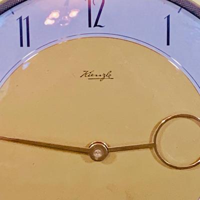 LOT 35: Art Deco Style Wind-up Mechanical Kienzle Brass Desk Clock and a White Ceramic MCM Table Lamp with Teal Colored Shade