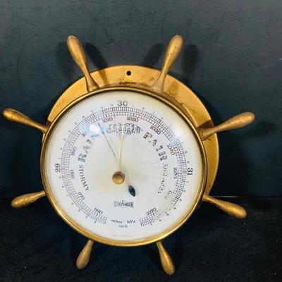LOT 39: Nautical Ship’s Wheel Style Clock and Barometers
