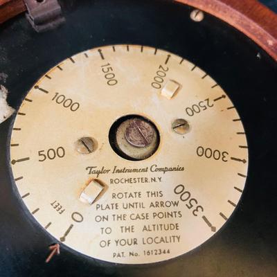 LOT 39: Nautical Ship’s Wheel Style Clock and Barometers