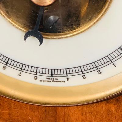 LOT 43: Collection of Wood Mounted Clock, Barometer and Thermometers Including Junghans Battery Desk Clock, Airguide Barometer, and More