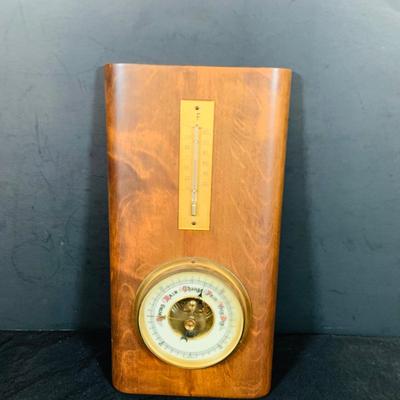 LOT 43: Collection of Wood Mounted Clock, Barometer and Thermometers Including Junghans Battery Desk Clock, Airguide Barometer, and More