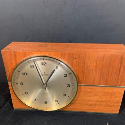 LOT 43: Collection of Wood Mounted Clock, Barometer and Thermometers Including Junghans Battery Desk Clock, Airguide Barometer, and More