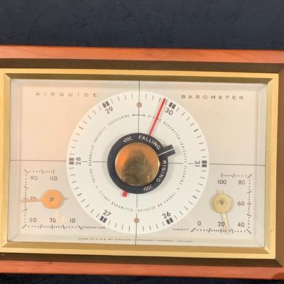 LOT 43: Collection of Wood Mounted Clock, Barometer and Thermometers Including Junghans Battery Desk Clock, Airguide Barometer, and More