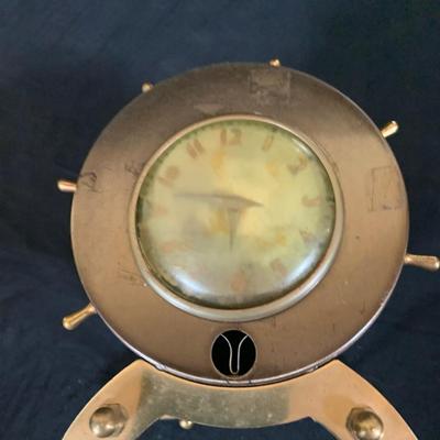 LOT 44 Seth Thomas Electric Ships Wheel Clock, a Park Sherman Cigarette Dispenser Ship’s Wheel Clock and a Versailles Barometer