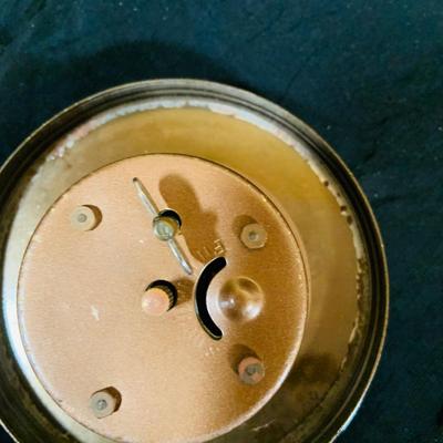 LOT 44 Seth Thomas Electric Ships Wheel Clock, a Park Sherman Cigarette Dispenser Ship’s Wheel Clock and a Versailles Barometer