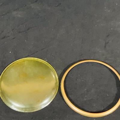 LOT 44 Seth Thomas Electric Ships Wheel Clock, a Park Sherman Cigarette Dispenser Ship’s Wheel Clock and a Versailles Barometer