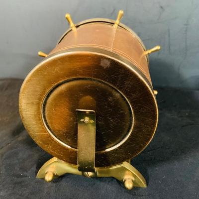 LOT 44 Seth Thomas Electric Ships Wheel Clock, a Park Sherman Cigarette Dispenser Ship’s Wheel Clock and a Versailles Barometer