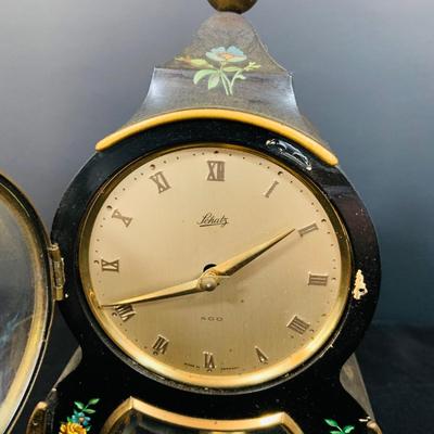 LOT 48: Vintage Floral Mechanical 400 Day Clock Collection by Schatz and More Including a Floral Sainte-Helene Thermometer