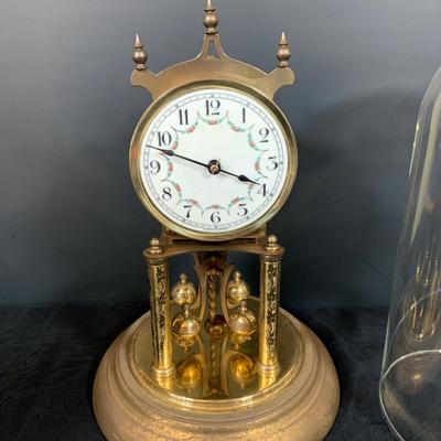 LOT 48: Vintage Floral Mechanical 400 Day Clock Collection by Schatz and More Including a Floral Sainte-Helene Thermometer