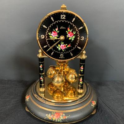 LOT 48: Vintage Floral Mechanical 400 Day Clock Collection by Schatz and More Including a Floral Sainte-Helene Thermometer