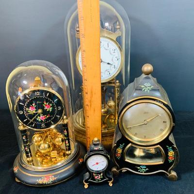 LOT 48: Vintage Floral Mechanical 400 Day Clock Collection by Schatz and More Including a Floral Sainte-Helene Thermometer