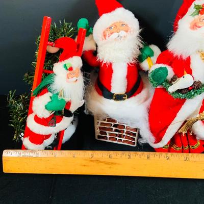 LOT 53: Annalee Santas Claus Collection- Decorating the Tree 2003, In the Chimney 2003 and Father Christmas 2004
