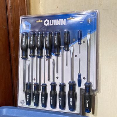 LOT 57: Bauer 4 1/2 Inch Heavy Duty Slide Switch Angle Grinder, Blades, Warrior Cut Off Wheels and Quinn 15 Piece Screwdriver Set (New in...