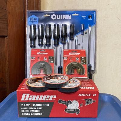 LOT 57: Bauer 4 1/2 Inch Heavy Duty Slide Switch Angle Grinder, Blades, Warrior Cut Off Wheels and Quinn 15 Piece Screwdriver Set (New in...