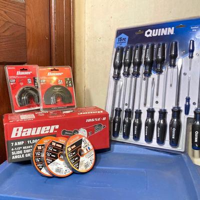 LOT 57: Bauer 4 1/2 Inch Heavy Duty Slide Switch Angle Grinder, Blades, Warrior Cut Off Wheels and Quinn 15 Piece Screwdriver Set (New in...